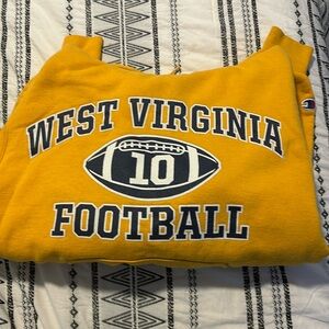 Yellow West Virginia football hoodie from champion